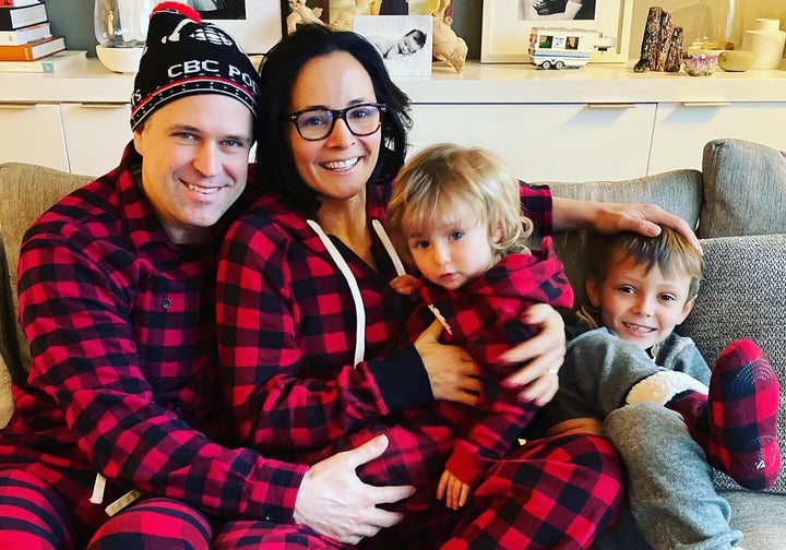 Sarah Edmondson with her husband Anthony "Nippy" Ames and their sons Ace and Troy. (Check out Nippy's CBC Podcasts hat!)