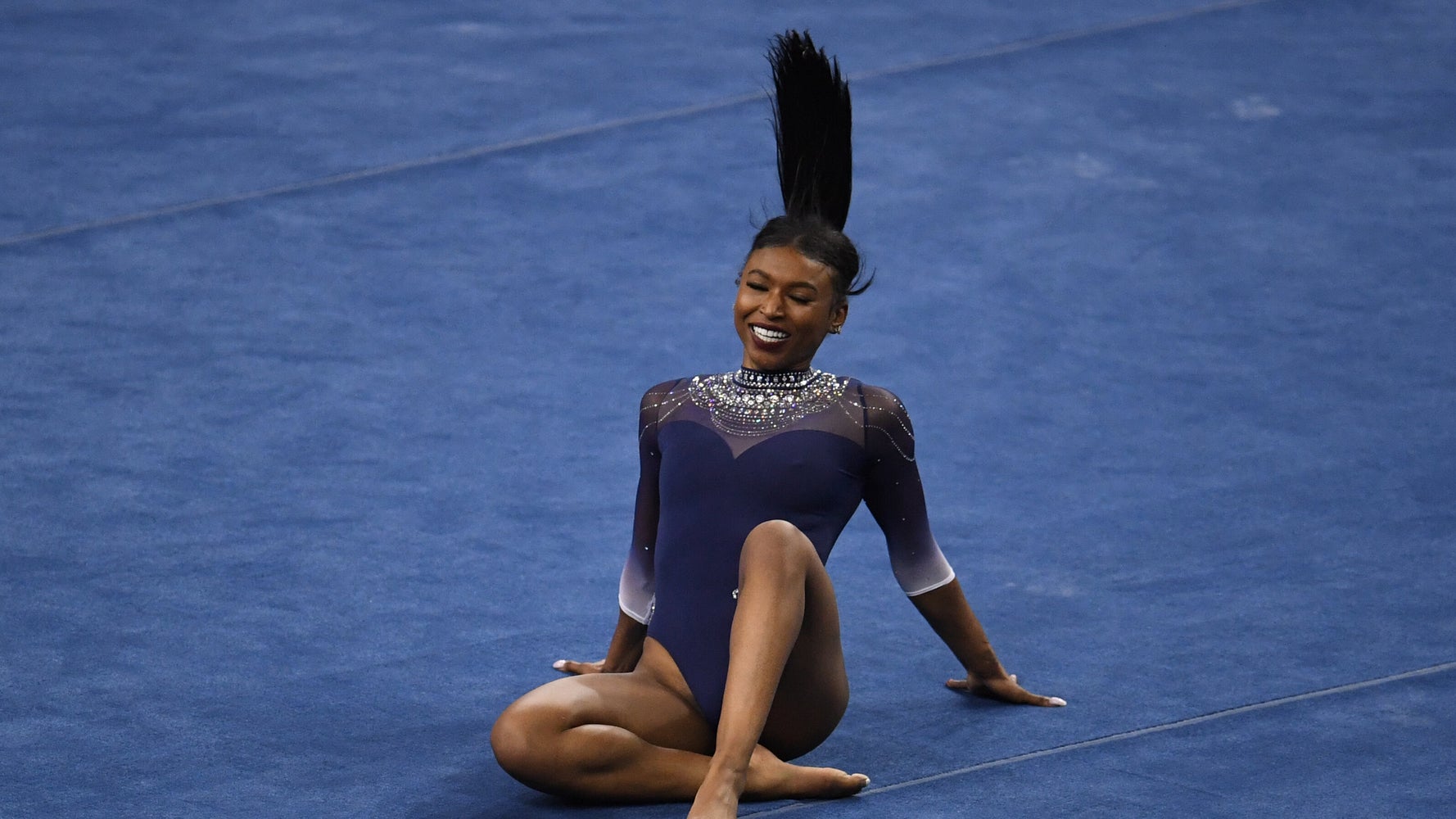 UCLA Gymnast Nia Dennis' Viral Floor Routine Was An Ode To Black