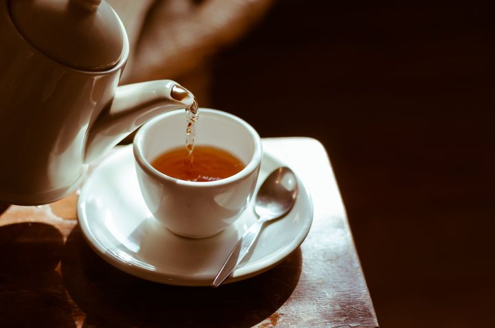 An 8-ounce cup of black tea boasts 48 milligrams of caffeine, and a cup of green tea contains around 29 milligrams.