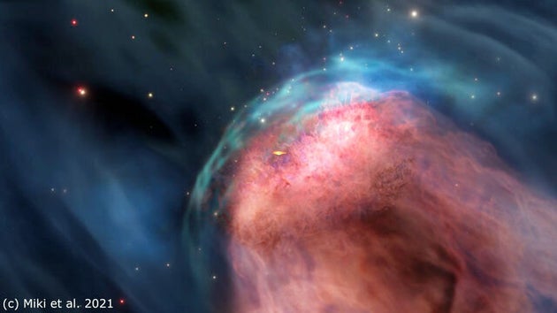 小さな銀河が左上から衝突し、ブラックホールの周りにあるガスが右下にはぎ取られていくイメージ=東京大提供