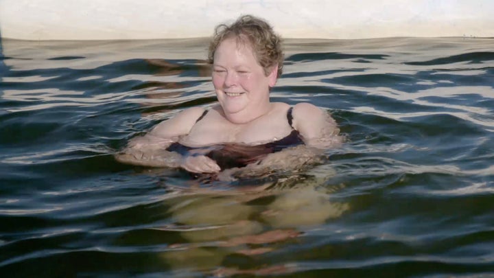 Anne Hegerty takes a swim with dolphins in the Chasers' new spin-off