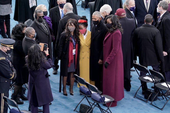 Poet Amanda Gorman (center) with former President Barack Obama and Michelle Obama on Jan. 20.