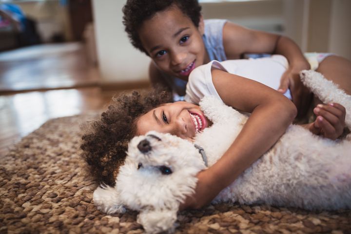 Pets can help kids with emotional management and the development of positive social behaviors. 