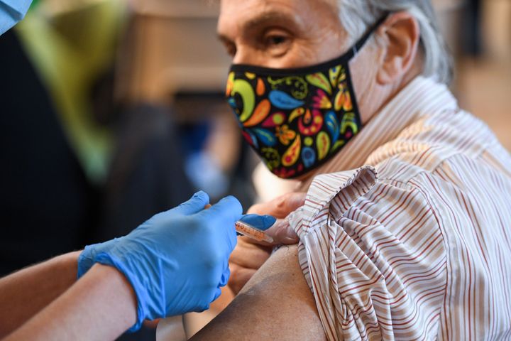 A member of the public receive the Oxford-AstraZeneca Covid-19 vaccine at a temporary vaccination centre in St Columba's Church in Sheffield.