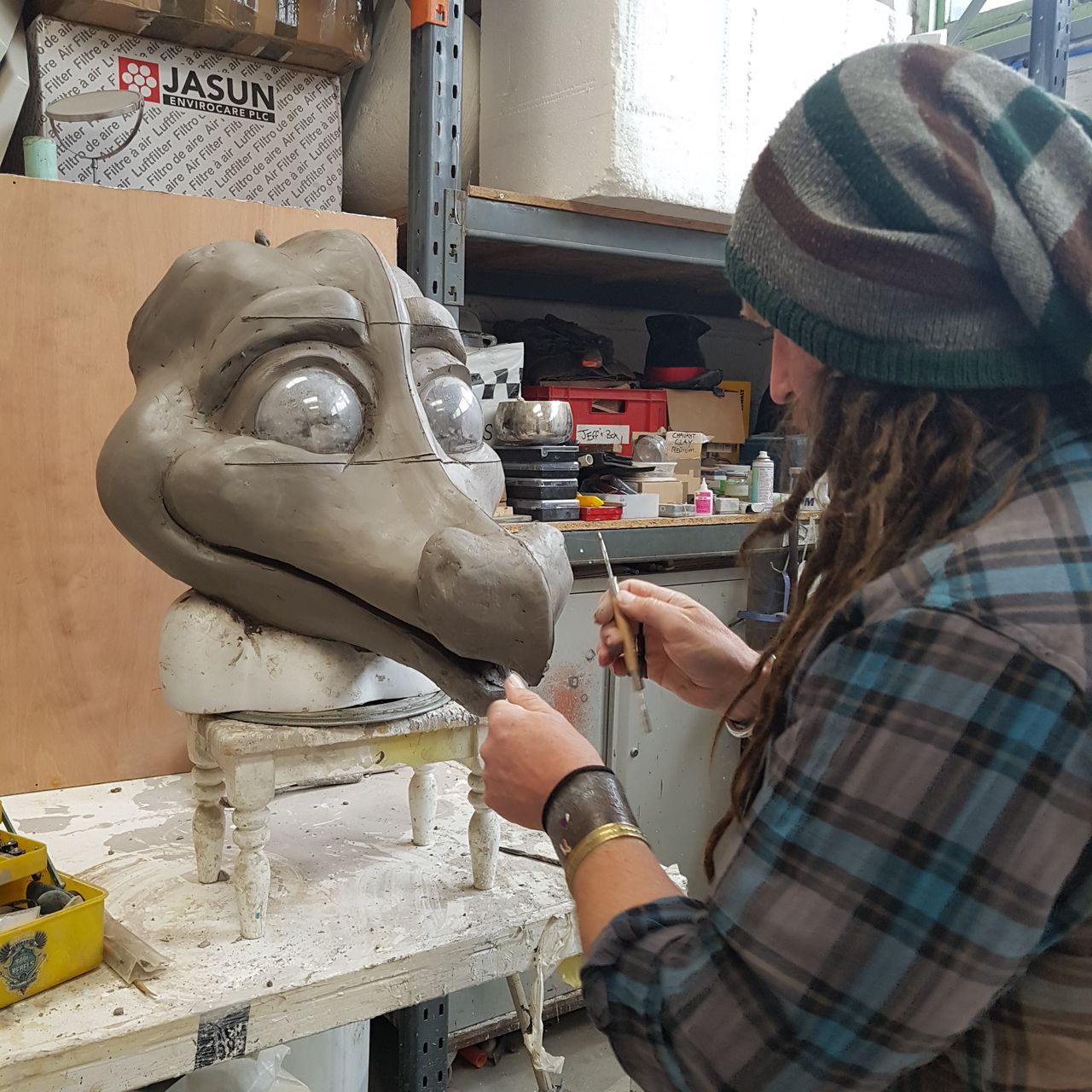 One of the Plunge Creations team gets to work on Dragon's mask