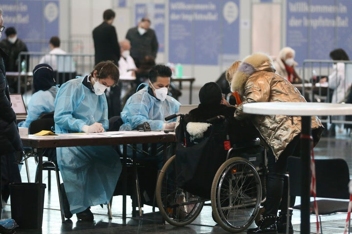 An elderly Jewish person arrives at a vaccination center to receive the Pfizer/BioNTech vaccine against the COVID-19 disease on International Holocaust Remembrance Day in Vienna, Austria, Wednesday, Jan. 27, 2021. 