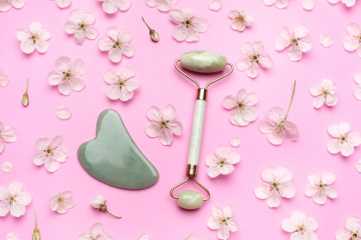 Jade rollers and gua sha tools have risen in popularity over the past several years, claiming to help sculpt your face.