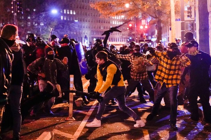 Members of the far-right group Proud Boys clash with counterprotesters in downtown Washington, D.C., on Dec. 12, 2020.