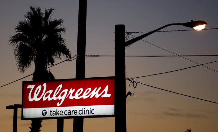 The mayors of three Palm Beach County cities, located roughly 40 miles away from their closest Publix, have suggested that other pharmacies be allowed to distribute the vaccines. A Walgreens pharmacy is seen in Belle Glade, Florida.