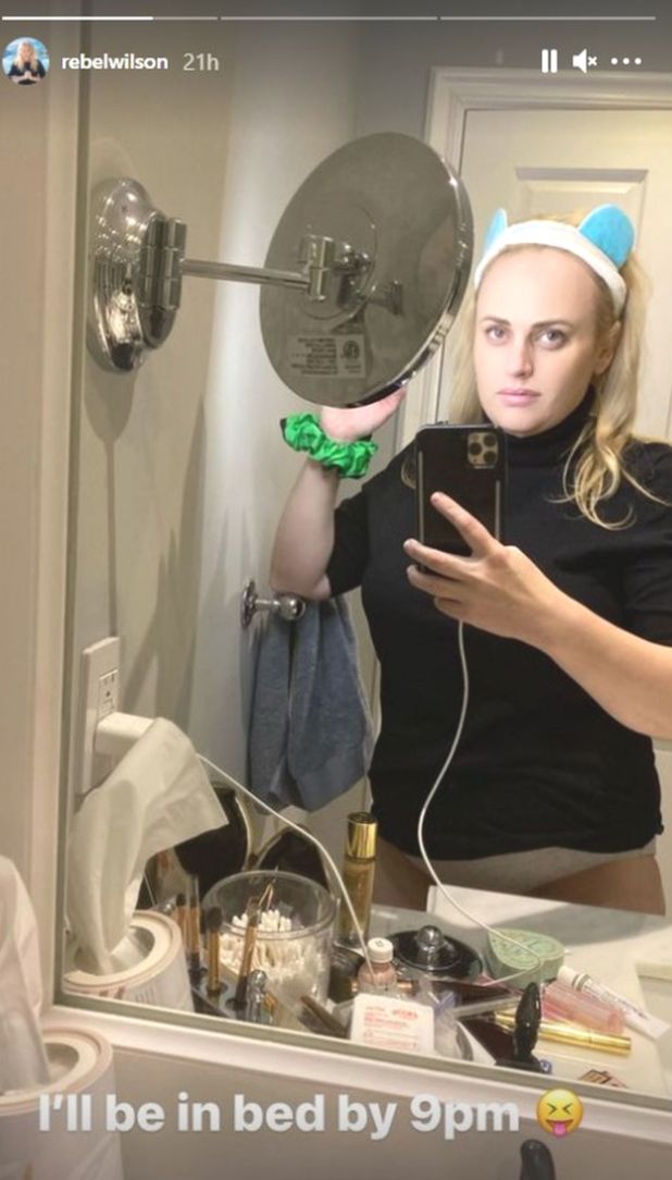 Rebel Wilson posted a cheeky pre-bed mirror selfie telling followers she likes to go to bed by 9pm. 