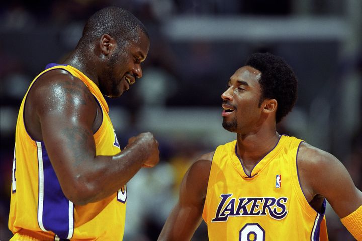 Shaquille O'Neal and Kobe Bryant of the Los Angeles Lakers speak to each other during a game against the Chicago Bulls at the Great Western Forum in Los Angeles in this undated file photo.