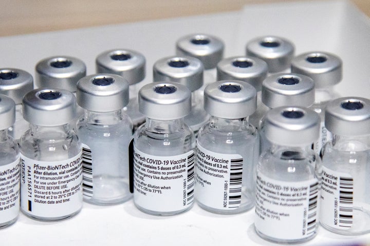 Empty vials of the Pfizer-BioNTech coronavirus disease (COVID-19) vaccine are seen at The Michener Institute in Toronto on Jan. 4, 2021.