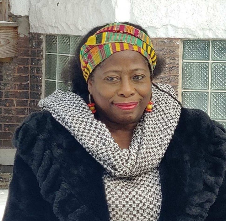 Naomi Davis, founder of Blacks in Green, stand outside Emmett Till's Chicago home after it was declared a landmark location.