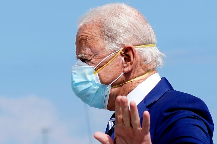 Joe Biden is seen here wearing two face masks in Florida on Oct. 13, 2020. The new U.S. president was often seen double-masking while on the campaign trail. 