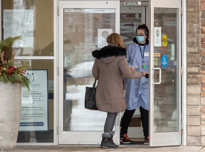 An essential visitor arrives at the Roberta Place Long Term Care home in Barrie, Ont., on Jan. 18, 2021.