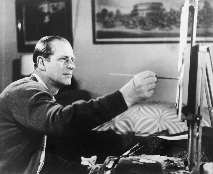 Prince Philip at work on one of his hobbies, painting, on June 19, 1969, as seen in a scene from the documentary "Royal Family."