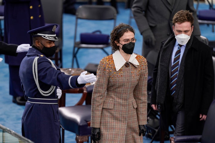 Ella and Cole Emhoff, the daughter and son of Vice President Kamala Harris's husband Doug Emhoff, are directed to their seats during the 59th presidential inauguration in Washington, D.C. on Wednesday, Jan. 20, 2021.