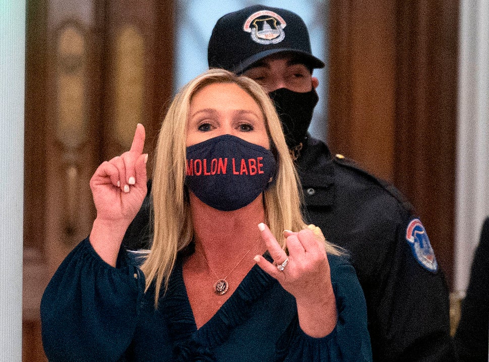 Greene shouts at journalists as she goes through security inside the U.S. Capitol on her way to the House of Representatives.