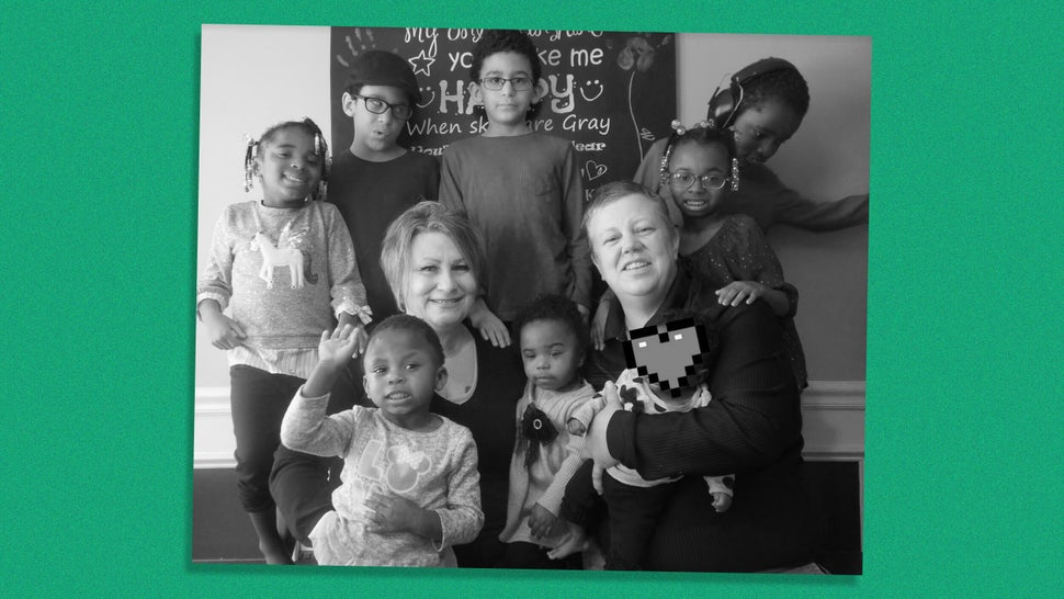 Diana Wright (right), her partner and their family. Seven of the children are adopted, all with disabilities. An eighth child
