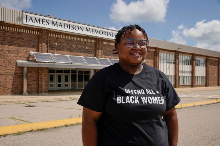 Adams stands outside James Madison Memorial High School. As a student there, she began organizing other youth activists to remove armed officers from the city’s schools. In June, she celebrated the school board’s vote to end its contract with the local police department.