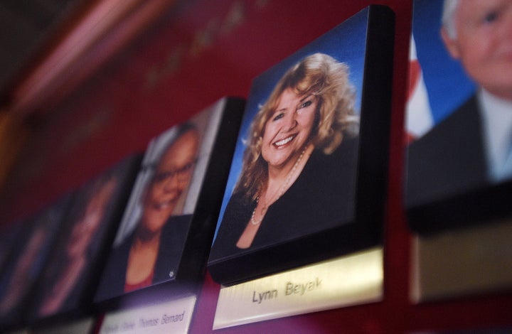 A picture of Lynn Beyak accompanies other senators' official portraits on a display outside the Senate on Parliament Hill in Ottawa on Sept. 21, 2017.