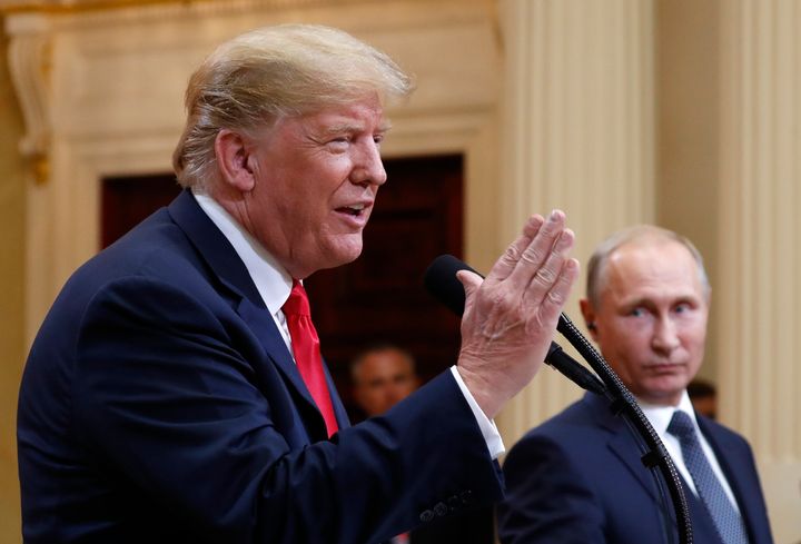  Trump speaks with Russian President Vladimir Putin during a press conference after their meeting at the Presidential Palace in Helsinki, Finland, Monday, July 16, 2018. (AP Photo/Pablo Martinez Monsivais)