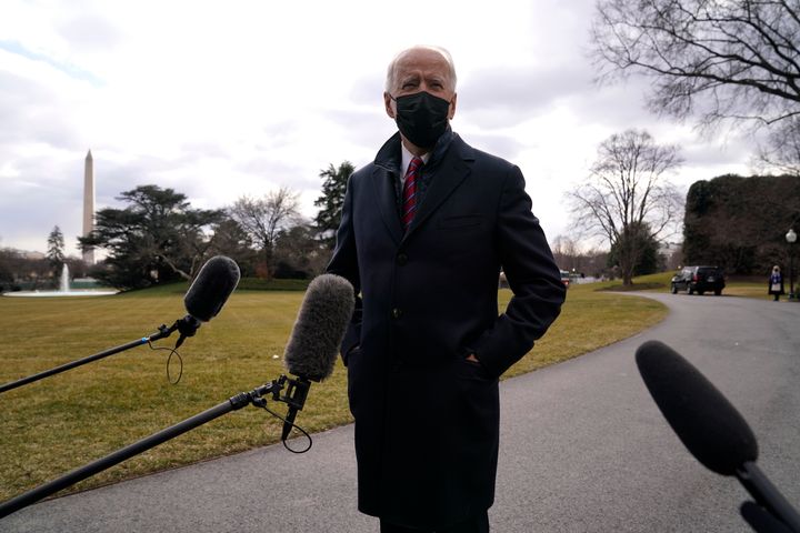 President Joe Biden speaks with reporters before boarding Marine One, Friday, Jan. 29, 2021, in Washington. Biden is travelin