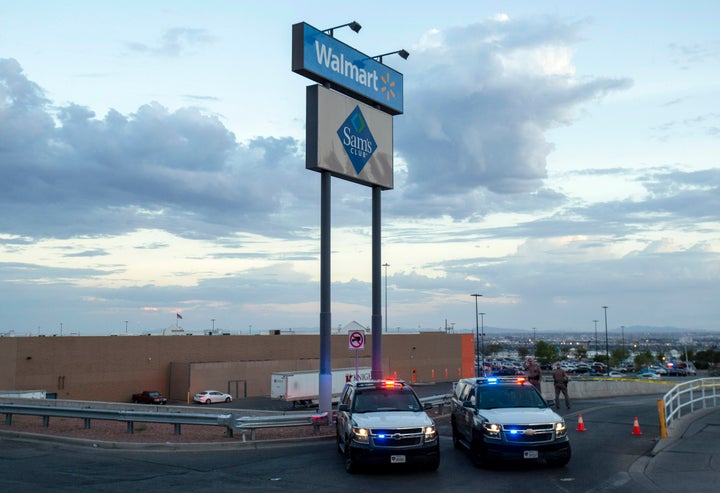 Texas state police cars are seen at the El Paso Walmart where a gunman opened fire and killed 22 people on Aug. 3, 2019.