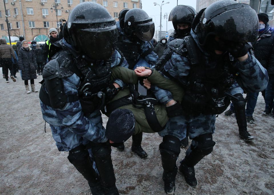 MOSCOW, RUSSIA - JANUARY 31: (RUSSIA OUT) Police detain a man during an unauthorized protest rally against...