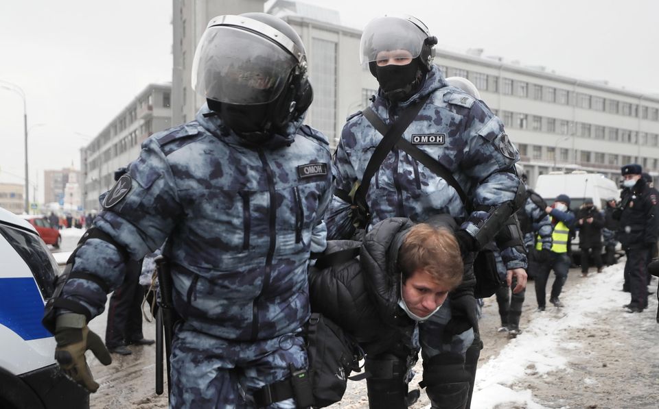 epa08976825 Russian police officers detain protester during an unauthorized protest in support of Russian...