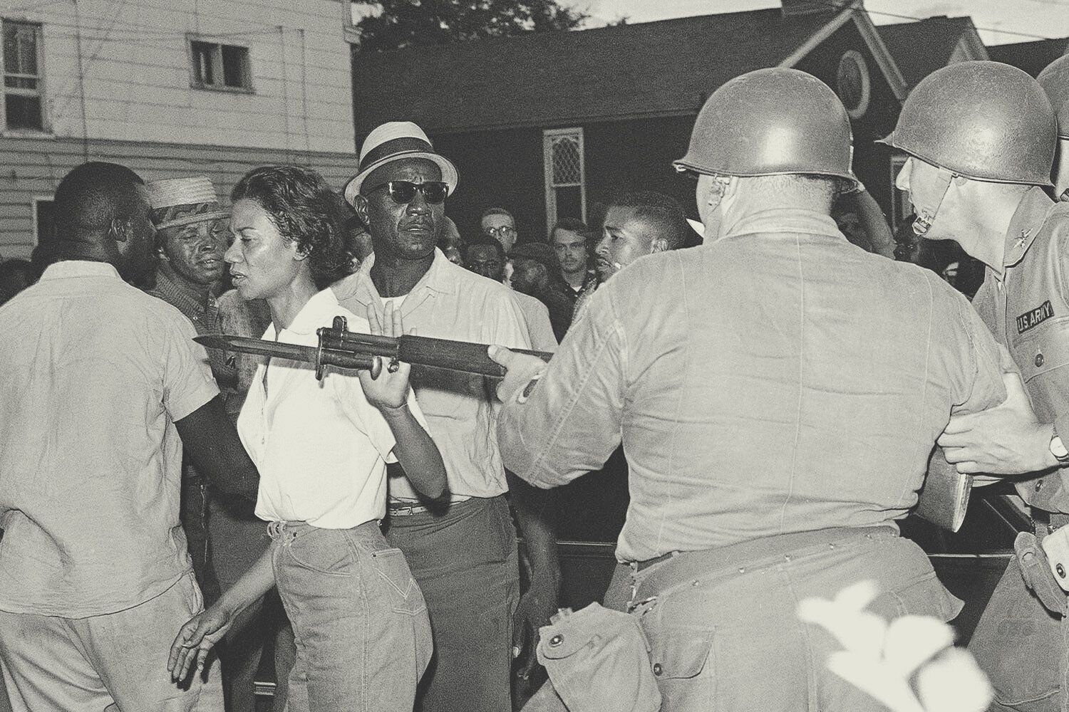 Gloria Richardson, head of the Cambridge Nonviolent Action Committee, pushes a National Guardsman’s bayonet aside in Cambridge, Maryland, on July 21, 1963. The crowd gathered after several Black Americans attempted to enter a street sealed off by troops. Richardson and Fred Jackson (left), a CNAC official, appealed to the crowd to disperse after the Guard threw a tear-gas grenade. AP Photo