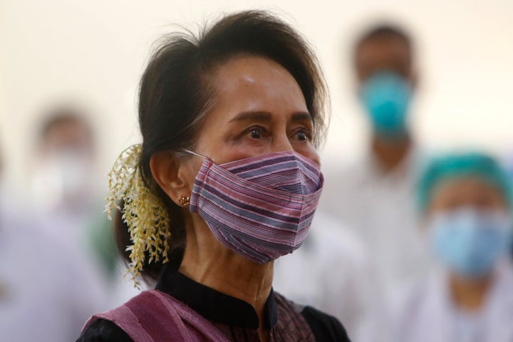 Myanmar leader Aung San Suu Kyi watches the vaccination of health workers at hospital Wednesday, Jan. 27, 2021, in Naypyitaw,