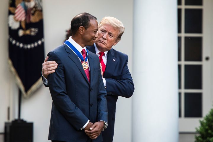 Donald Trump awarding the Medal Of Freedom to Tiger Woods in 2019