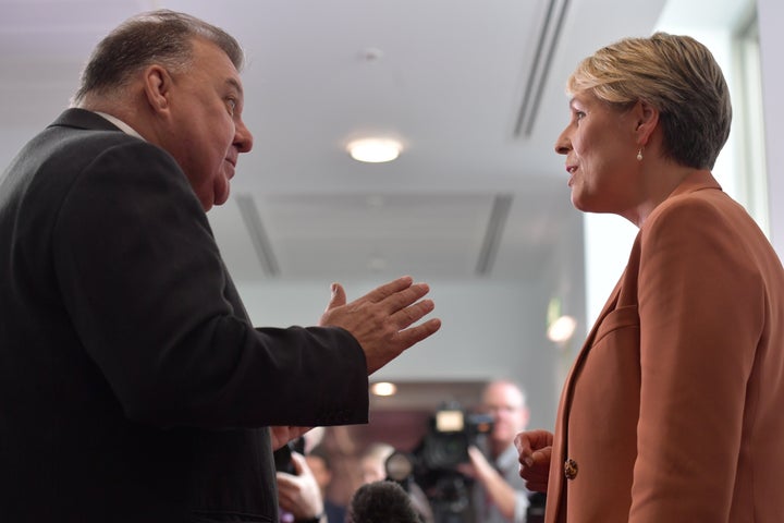 Member for Hughes Craig Kelly and Member for Sydney Tanya Plibersek argue in the Media Gallery at Parliament House on February 3 in Canberra.