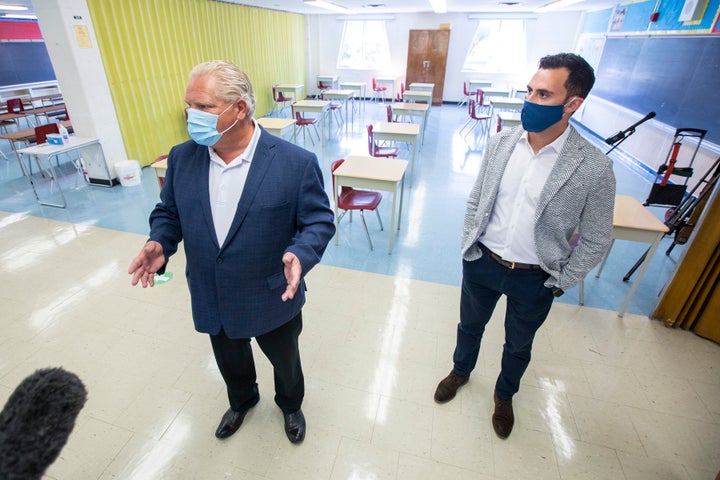 Ontario Premier Doug Ford and Education Minister Stephen Lecce take a tour of Kensington Community School on Sept. 1, 2020.