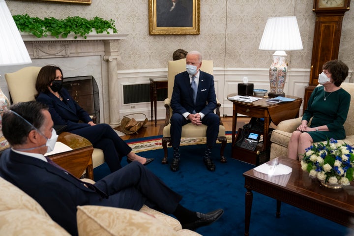 President Joe Biden and Vice President Kamala Harris meet with Republican lawmakers to discuss a coronavirus relief package in the Oval Office of the White House on Feb. 1. From left, Sen. Mitt Romney of Utah, Harris, Biden, and Sen. Susan Collins of Maine.