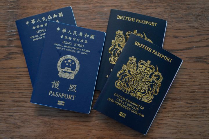 British National Overseas (BNO) passports sit on a table on Jan. 31, 2021. China and Hong Kong say they no longer recognize the BNO passport as a valid travel document.