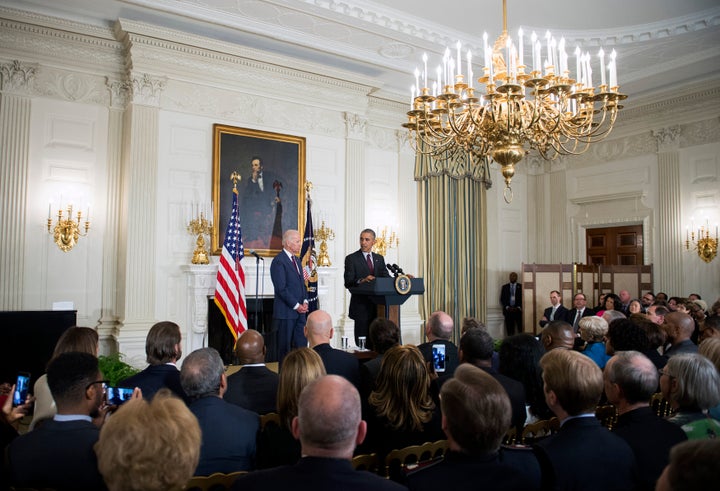 President Barack Obama, joined by then-Vice President Joe Biden, delivers remarks at an Easter Prayer Breakfast at the White 