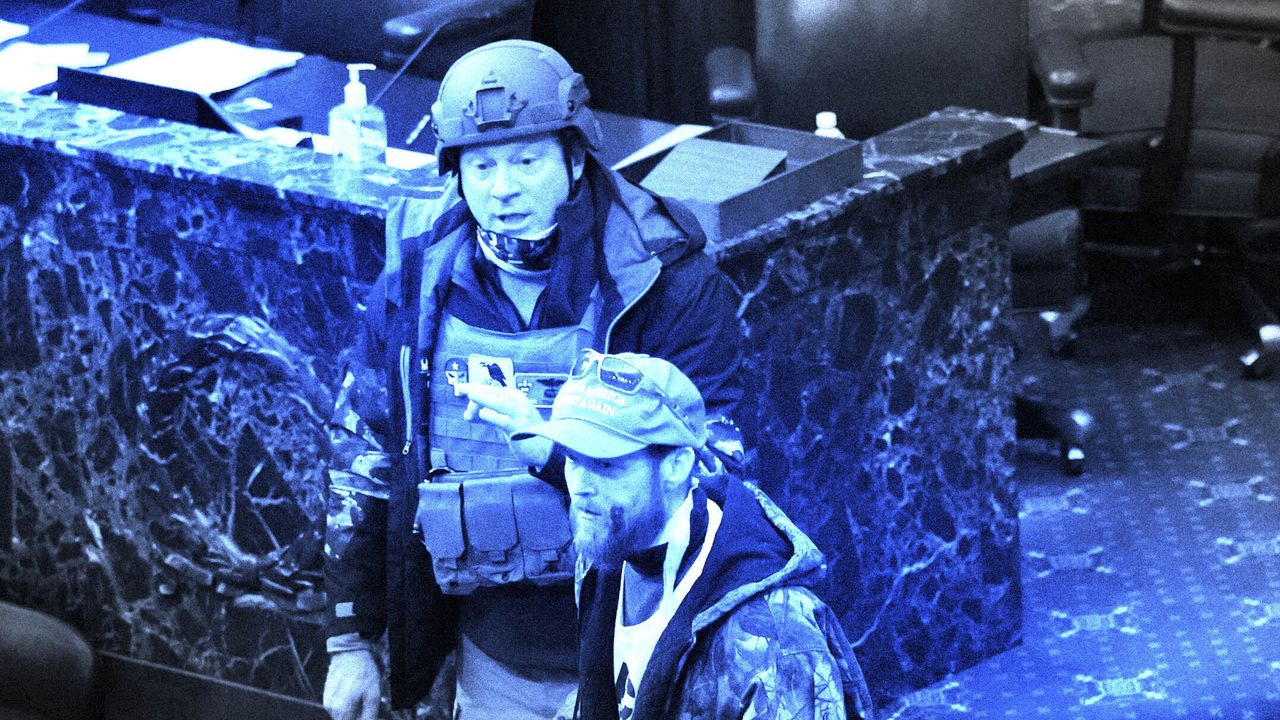 Larry Rendall Brock Jr. wears a combat helmet and vest after entering the Senate chamber on Jan. 6 during the Capitol riot in Washington, D.C.
