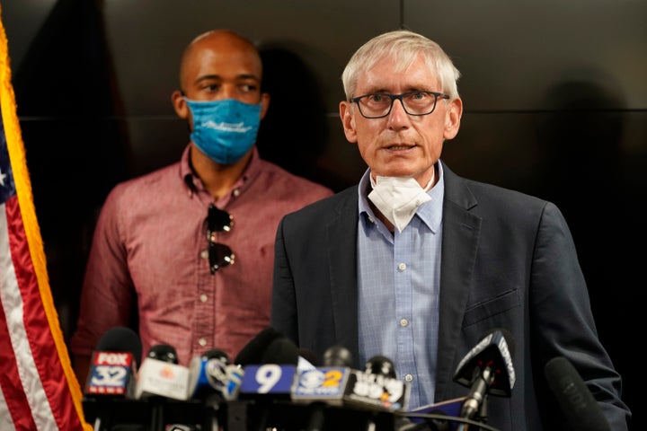 FILE - In this Aug. 27, 2020 file photo, Wisconsin Gov. Tony Evers speaks during a news conference in Kenosha, Wis. The Wisconsin Supreme Court was hearing arguments Monday, Nov. 16, on whether to strike down the state's mask mandate being challenged by conservatives as an unconstitutional overreach of power by Gov. Evers. (AP Photo/Morry Gash, File)