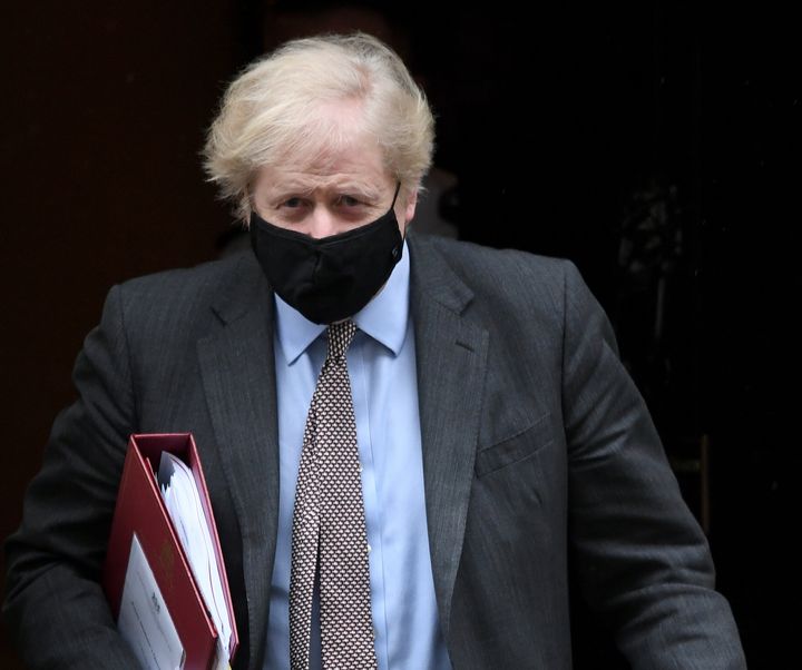 Prime Minister Boris Johnson leaves 10 Downing Street to attend Prime Minister's Questions at the Houses of Parliament, London. Picture date: Wednesday February 3, 2021.