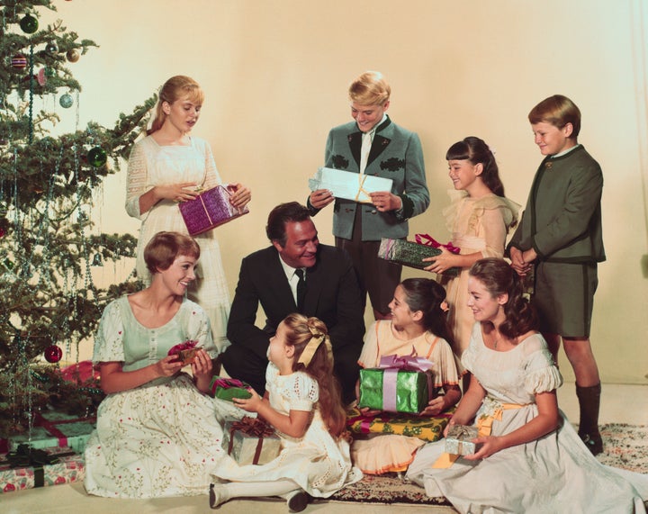 Julie Andrews (left) and Plummer (center, in suit) in "The Sound of Music."