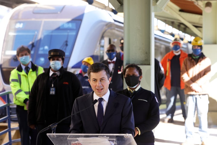 Pete Buttigieg speaks to Amtrak employees during a visit to Union Station in Washington, D.C., on Friday.