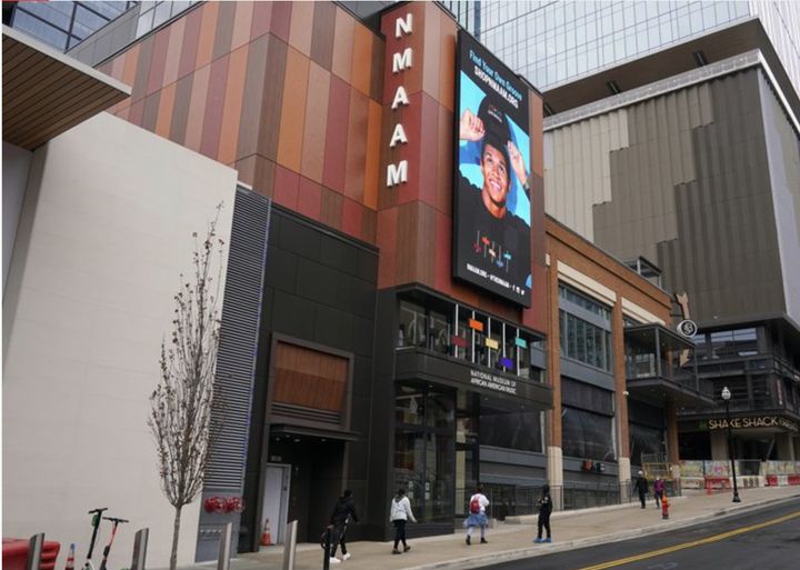 People walk to the entrance of the National Museum of African American Music, Saturday, Jan. 30, 2021, in Nashville, Tenn. Unlike other museums that focus on a genre or label, this new museum is the first to span multiple genres including gospel, blues, jazz, R&B and hip hop. 