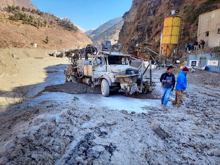<strong>People inspect the site near the damaged Dhauliganga hydropower project at Reni village in Chamoli district after a portion of Nanda Devi glacier broke off in Tapovan area of the northern state of Uttarakhand.</strong>