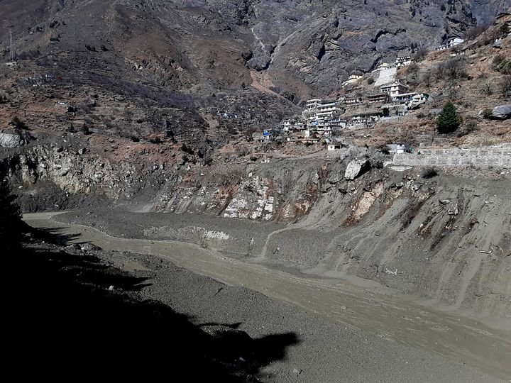 <strong>Mud and slash are seen in the Dhauliganga River after a portion of Nanda Devi glacier broke off in Tapovan area of the northern state of Uttarakhand.</strong>