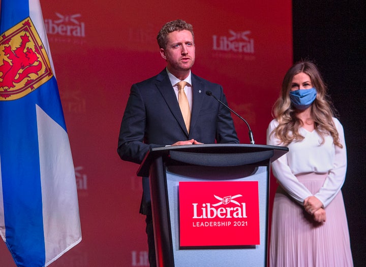 Iain Rankin, accompanied by his wife Mary, addresses supporters after winning the leadership of the Nova Scotia Liberal party at a virtual convention in Halifax on Saturday.