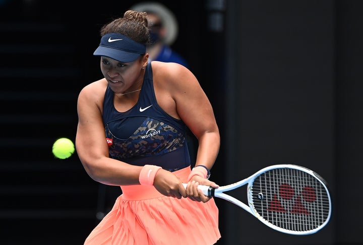 Naomi Osaka of Japan plays a backhand in her Women's Singles first round match against Anastasia Pavlyuchenkova of Russia during day one of the 2021 Australian Open at Melbourne Park on February 08, 2021.