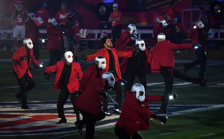 The Weeknd performs among dancers during the 2021 Super Bowl halftime show in Tampa, Florida.