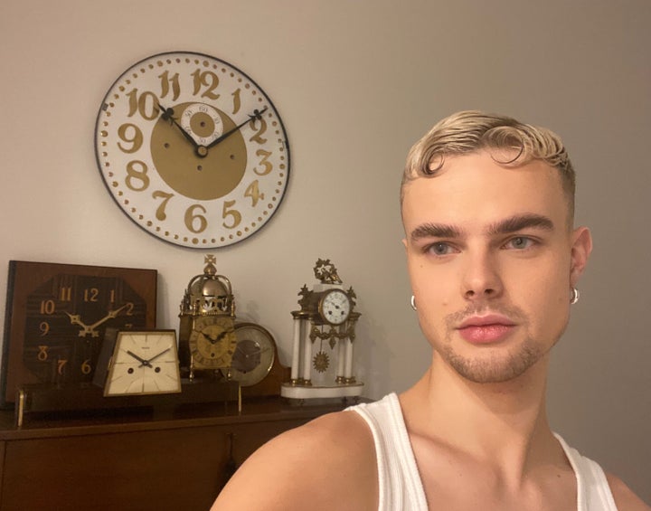 Samuel Handley (Gothy Kendoll) at home with some of his finest clocks.